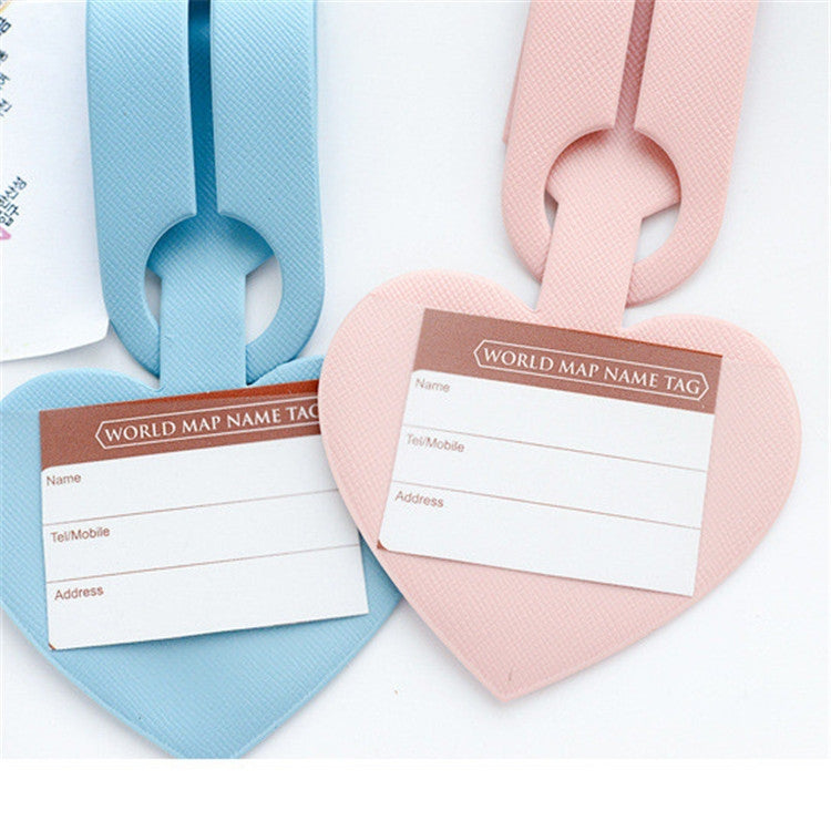 Blue and pink heart-shaped luggage tags with name card label windows