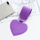 Purple heart-shaped luggage tag with hanging loop for name card and travel pass