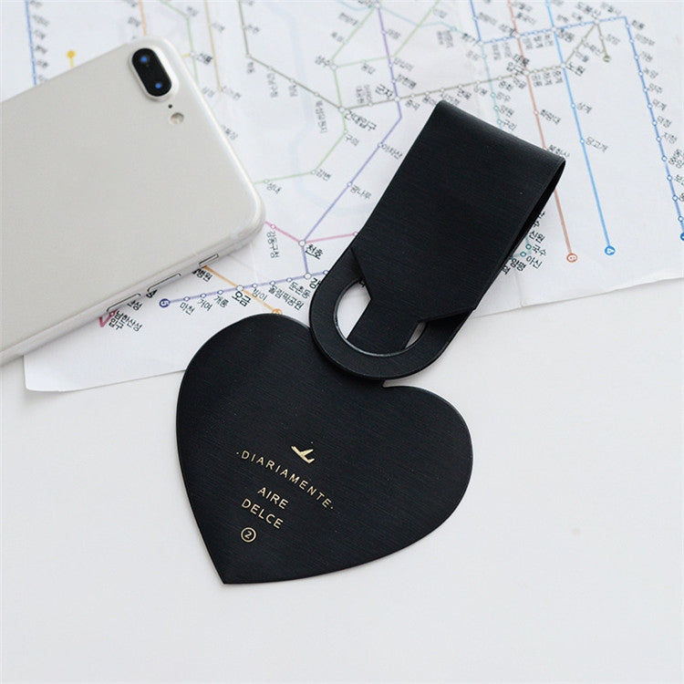 Black heart-shaped luggage tag with hanging loop for name card and travel pass