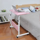 Removable laptop desk with pink top, white frame, storage shelf, and rolling casters