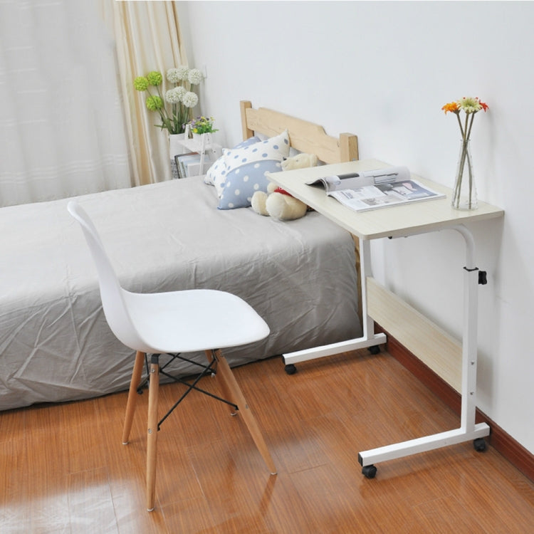 Bedside laptop desk with lift tabletop, white wood-look finish, on rolling casters