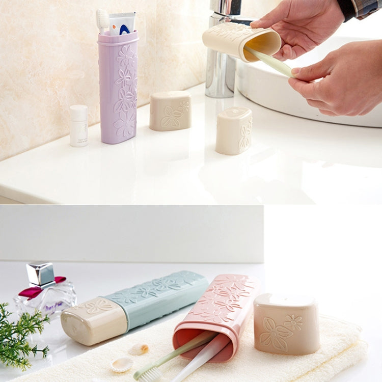 Car toothbrush storage cup with flip-top cover; hand opens the beige holder