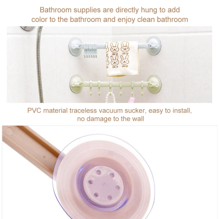 Beige suction cup towel hook bar with several hooks on wall