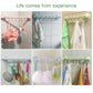 Beige suction cup wall towel hooks with hanging kitchen items