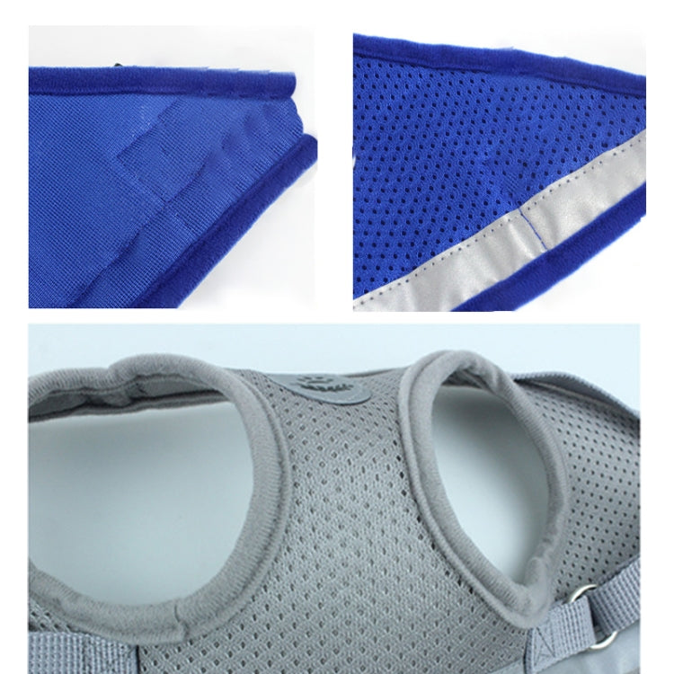 Blue reflective mesh dog safety vest harness fabric and silver trim close-up