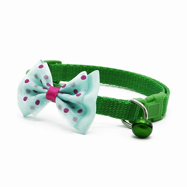Adjustable pet bell collar with mint bow and green collar and bell