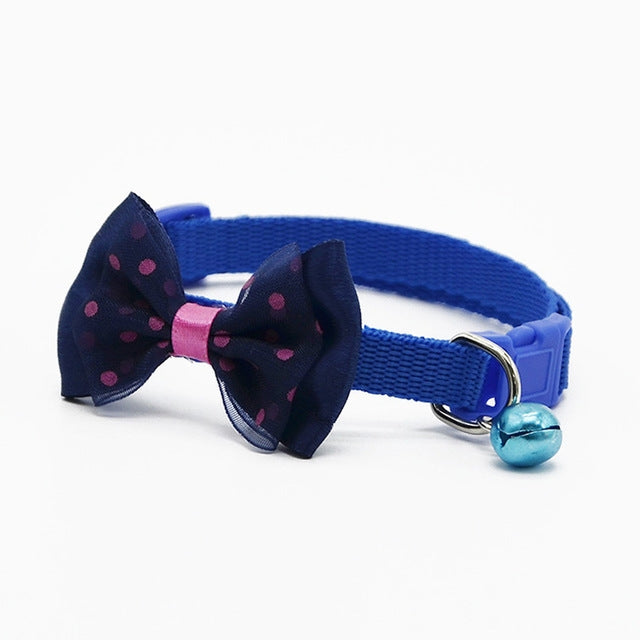 Adjustable pet bell collar with dark blue bow and blue collar with blue bell