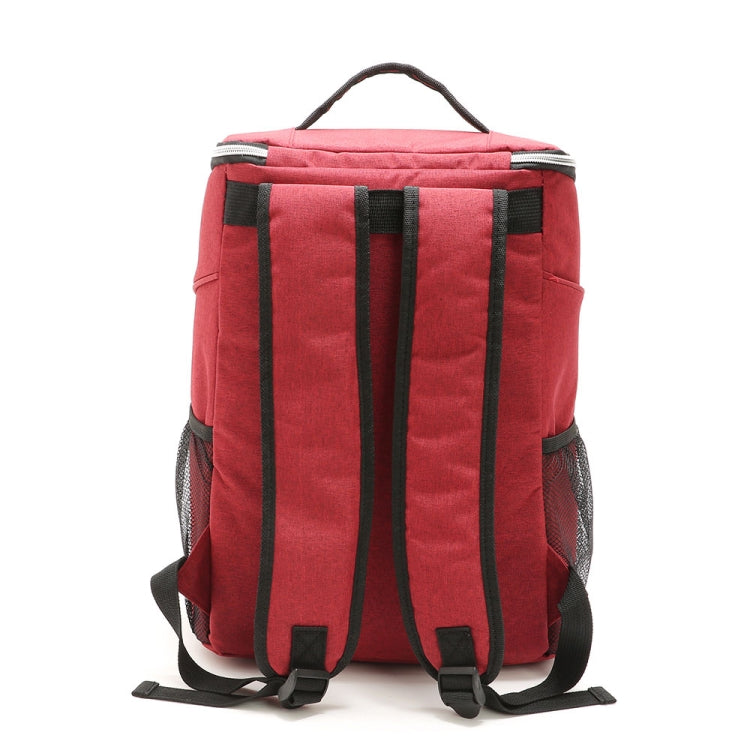 Red insulated cooler backpack with adjustable back straps and front zipper