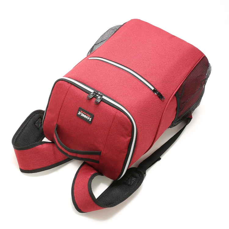 Red insulated cooler backpack with curved front zipper and black carry strap