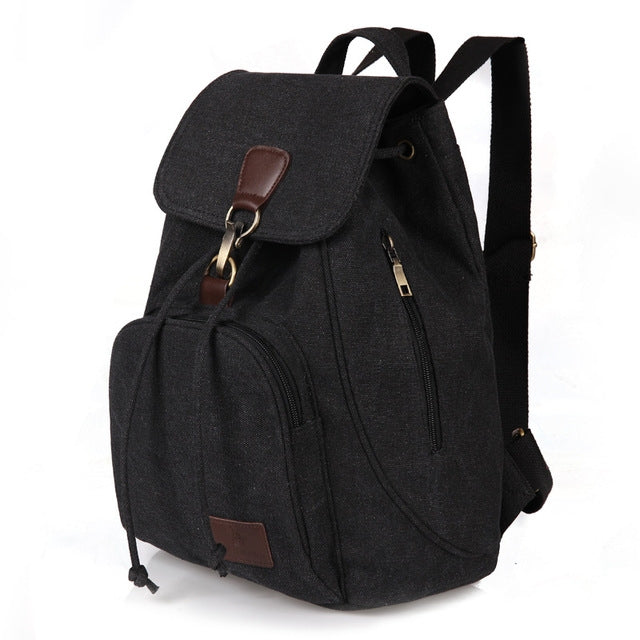 Black canvas student laptop backpack with front flap and adjustable shoulder straps