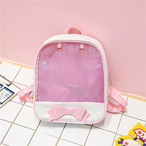 Mini transparent children's backpack in pink with bow front detail and top handle