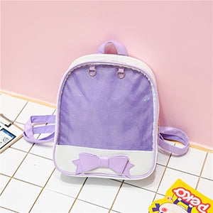 Mini transparent children's backpack in purple with bow front detail and top handle