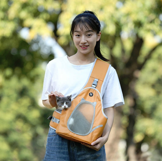 Orange-brown pet shoulder carrier bag with mesh window and adjustable strap