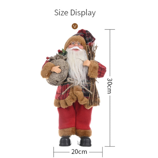 Standing Santa Claus doll ornament in red outfit holding a bag; height 30cm shown