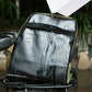 ROSWHEEL bicycle back pack in black with water droplets on the front panel