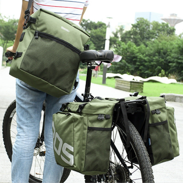 ROSWHEEL bicycle back pack in green with black trim, buckles, and side pocket