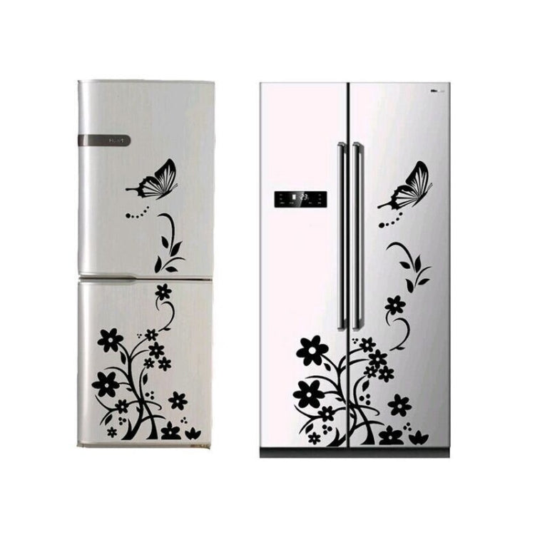 Black floral refrigerator sticker with a bird, butterfly, vines, and blossoms on two doors.