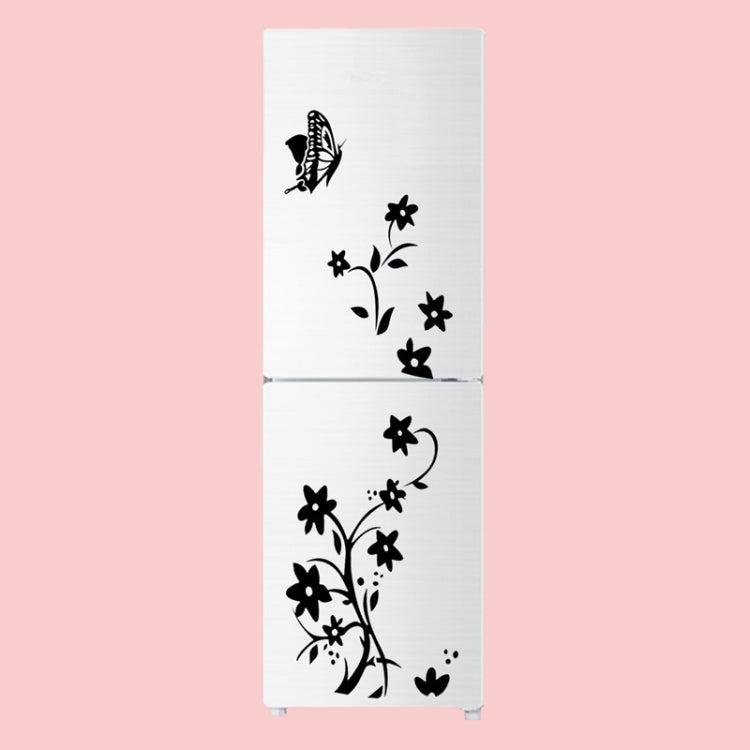 Black flower and vine refrigerator sticker with bird and blossoms on a two-door fridge.