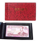 Small square banknote collection book with rose red cover and banknote displayed inside