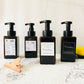 Set of four square foam press bottles with black pumps, various labels, One day