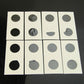 Coin protector cards set, white square sheets with circular openings in a grid