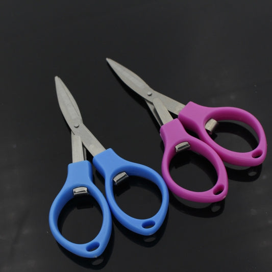 Foldable mini scissors with stainless blades and blue handles, compact pocket size