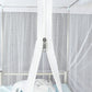 Zip slider on white mosquito net doorway panel for easy entry