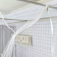 White mosquito net drape with metal frame and zip pull at doorway