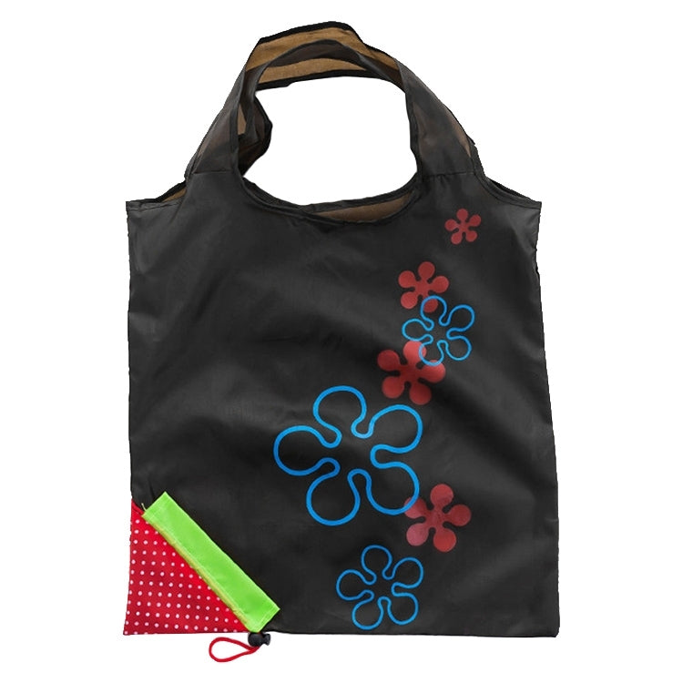 Black reusable folding grocery shopping bag with colorful flower appliques and side pocket