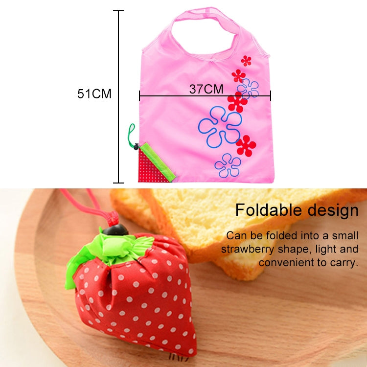 Pink reusable folding grocery shopping bag with flower appliques and red polka pocket
