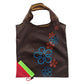 Brown reusable folding grocery shopping bag with colorful flower appliques and green trim