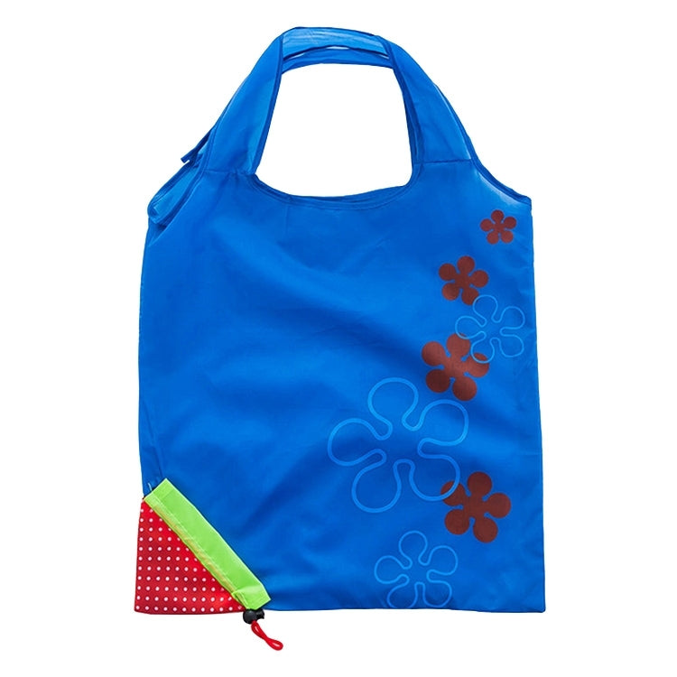 Blue reusable folding grocery shopping bag with flower appliques and red polka side pocket