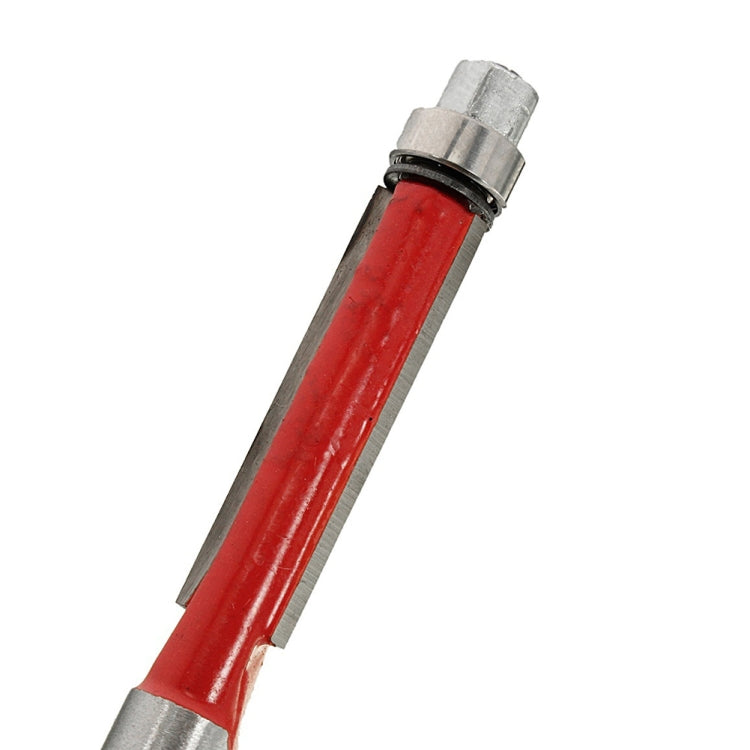 Flush trim router bit close-up: red body with gray shank collar and cutting edge