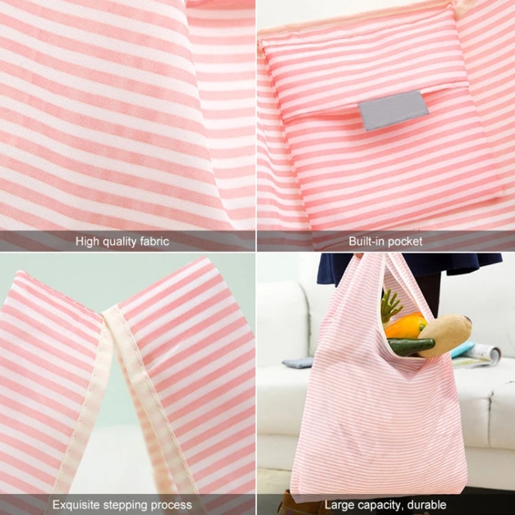 Foldable shopping bag, pink and white striped, visible inner pocket panel at top