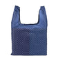 Foldable shopping bag, dark blue with small white dots, open tote with U handles