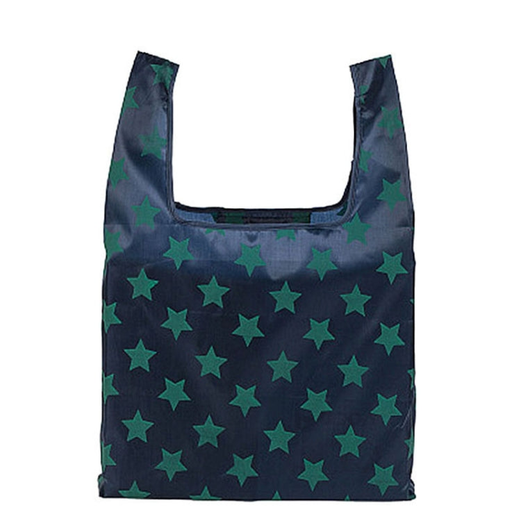 Foldable shopping bag, dark navy with green star pattern, open tote with U handles