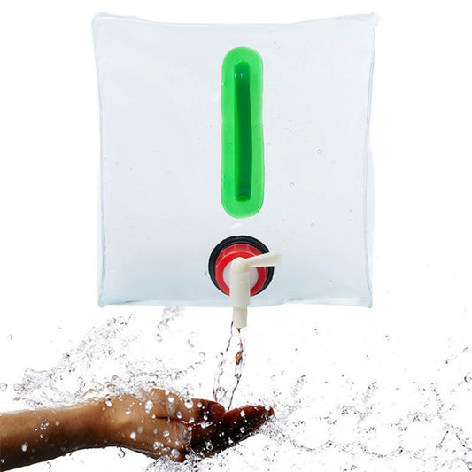 Transparent 20L folding water bag with green handle and spigot, water flow