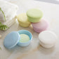 Set of pastel covered soap boxes with round lids and bases