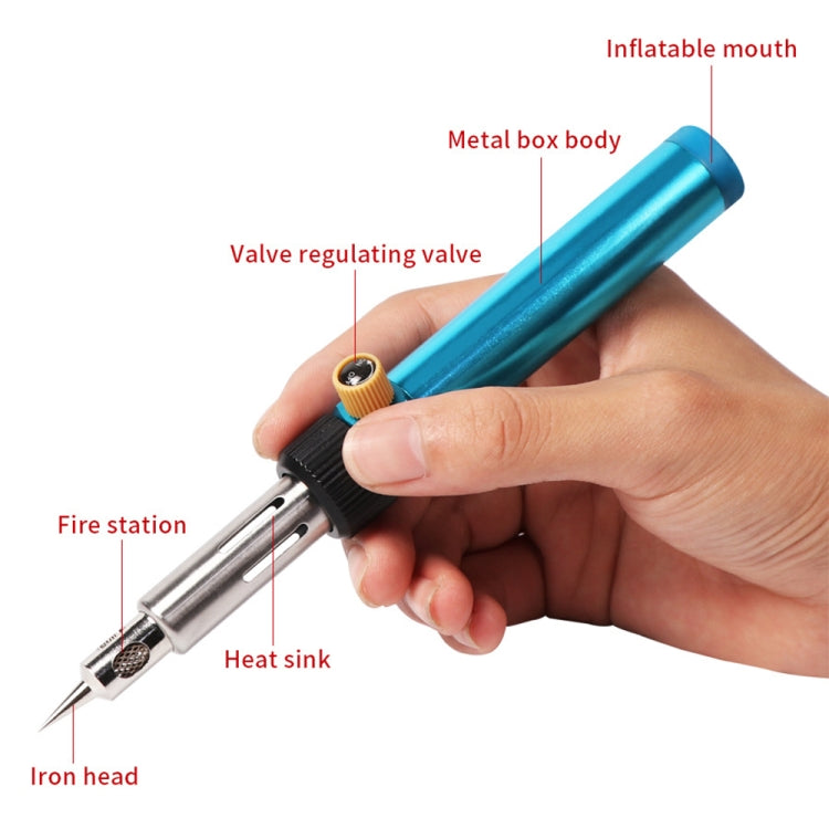 Cordless gas soldering iron in blue with iron head and heat sink, held in hand