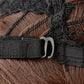 Close-up of wig cap with adjustable strap and metal clasp on dark base