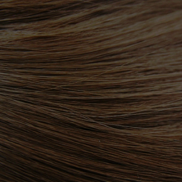 Close-up of long straight wig hair strands in warm brown