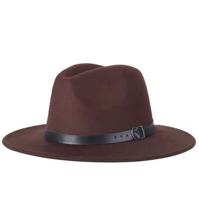 Brown fedora hat with black buckle band and wide brim, wool-blend jazz style.