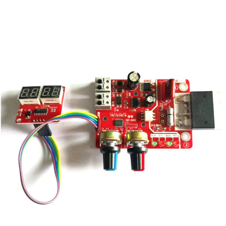 Spot welding machine control board with digital display, red PCB, multi-color wiring, two black standoff posts.