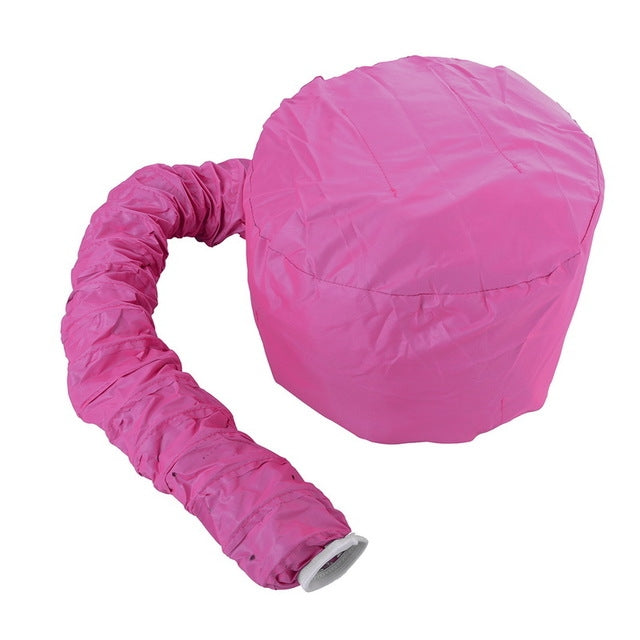 Pink warm-air hair drying cap with flexible diffuser tube and cuffed end