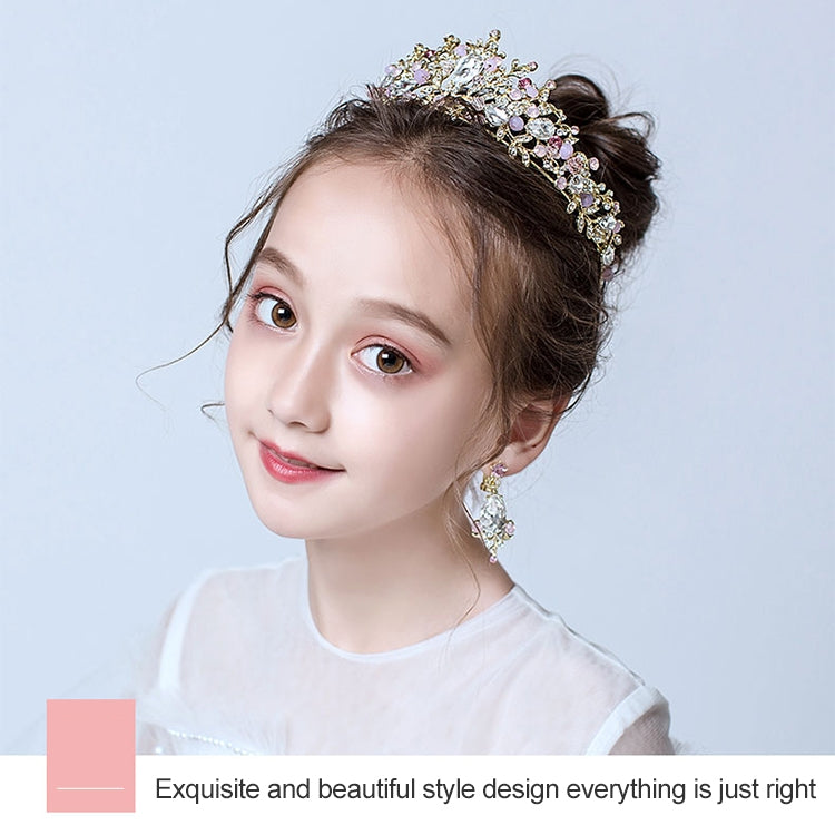 Pink jeweled bridal tiara worn in hair with matching drop earrings