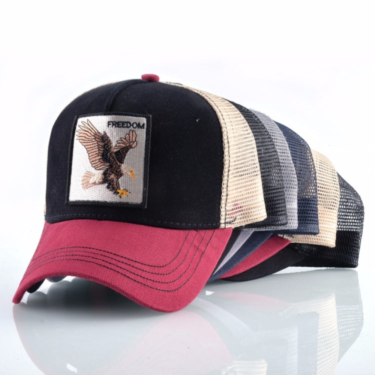 Black and beige mesh baseball cap with embroidered eagle patch and red brim