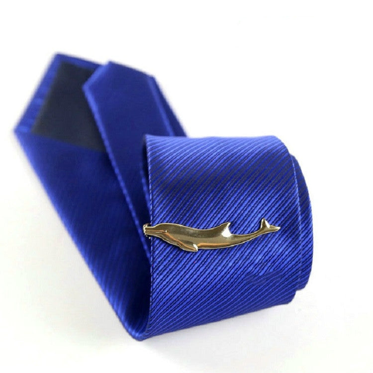 Gold dolphin tie clip on blue striped necktie, shown with gift box