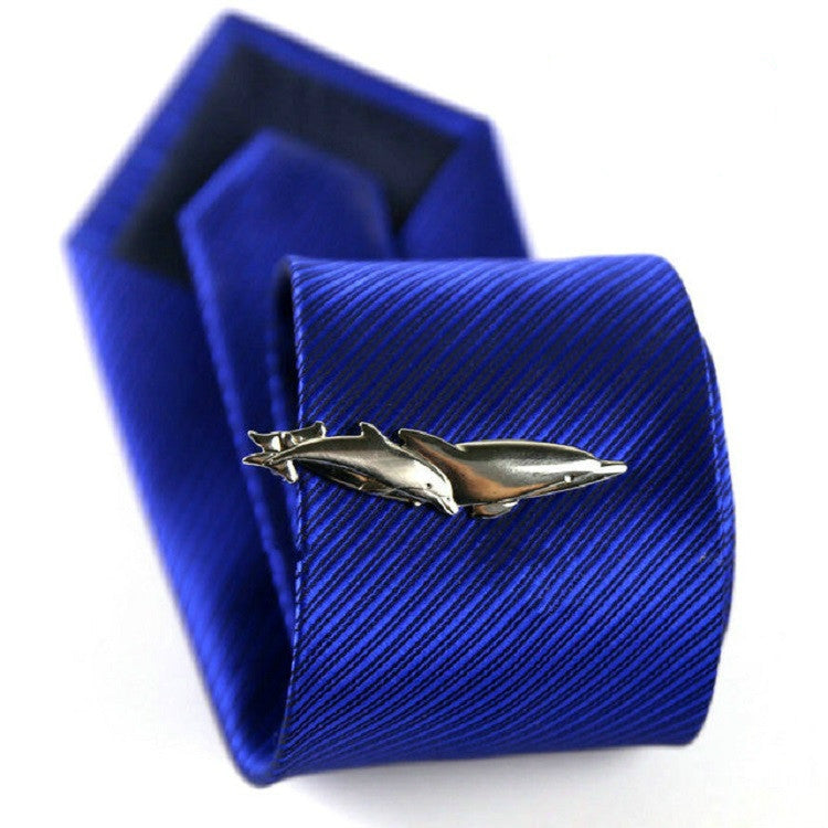 Blue striped tie with silver dolphin tie clip, men’s formal accessory