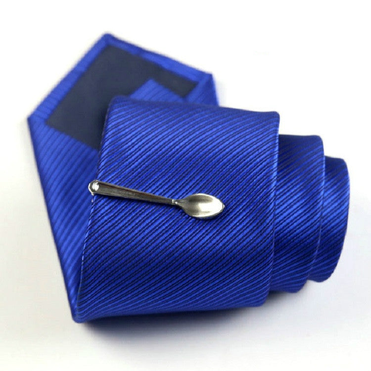 Blue striped tie with silver spoon tie clip, men’s formal accessory