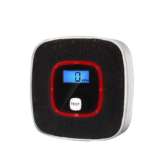 Black carbon monoxide detector with red ring, blue LCD reading 0 PPM, TEST button